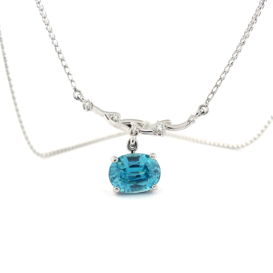 Blue zircon necklace, inspired by an olive branch - a symbol of peace.