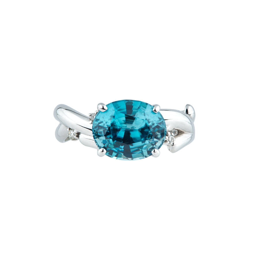 Blue zircon ring, inspired by an olive branch - a symbol of peace.